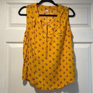 Yellow tank blouse with tie and floral design